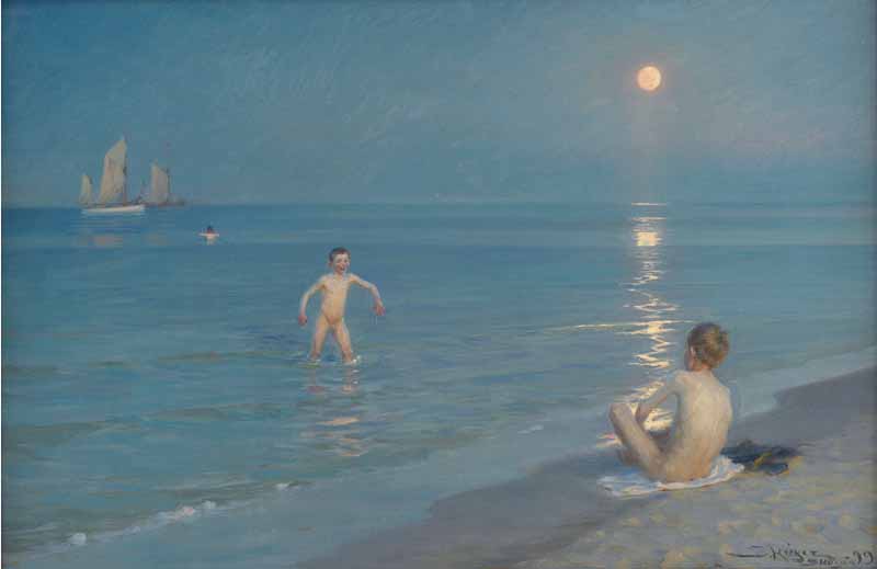 Boys bathing on a summer evening at Skagen Beach